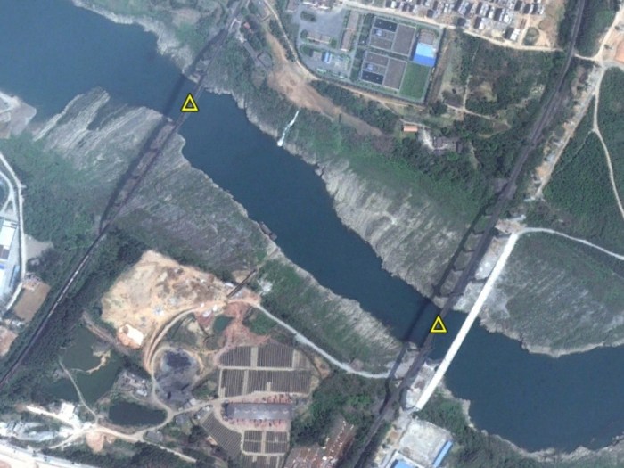 Figure 15: Xingbin's twin rail bridges require high spans because of the elevated banks, making this crossing difficult to repair temporarily. The next nearest railroad bridge is 100 nm downstream, and is also targeted.